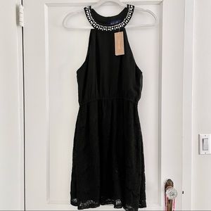 Francesca’s Black Pearl and lace dress